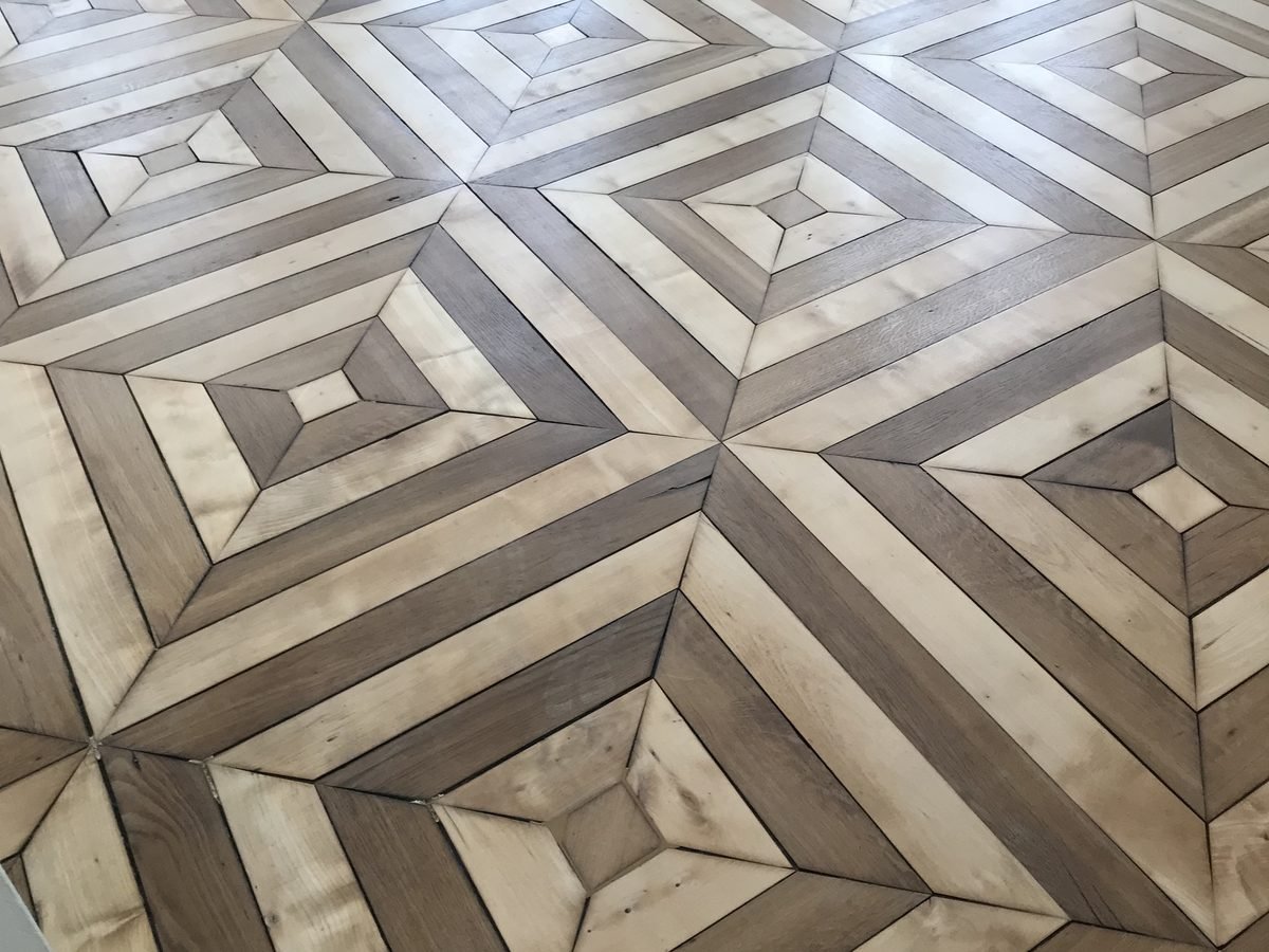 Parquet en panneaux de Versailles restauré dans un appartement parisien
